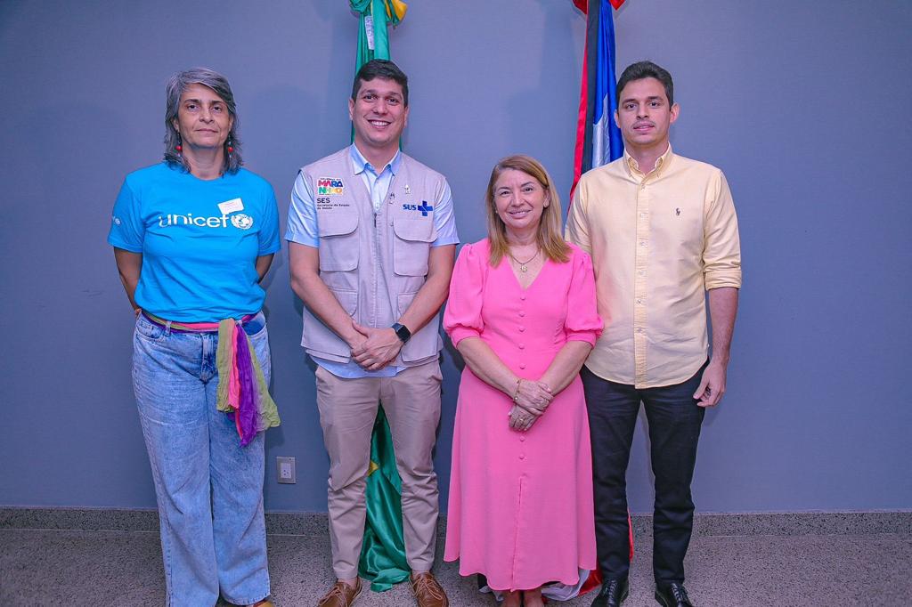 Iracema Vale em registro com Ofélia Silva, Tiago Fernandes e Ivo Rezende na reunião que objetivou a melhoria da cobertura vacinal infantil no Maranhão